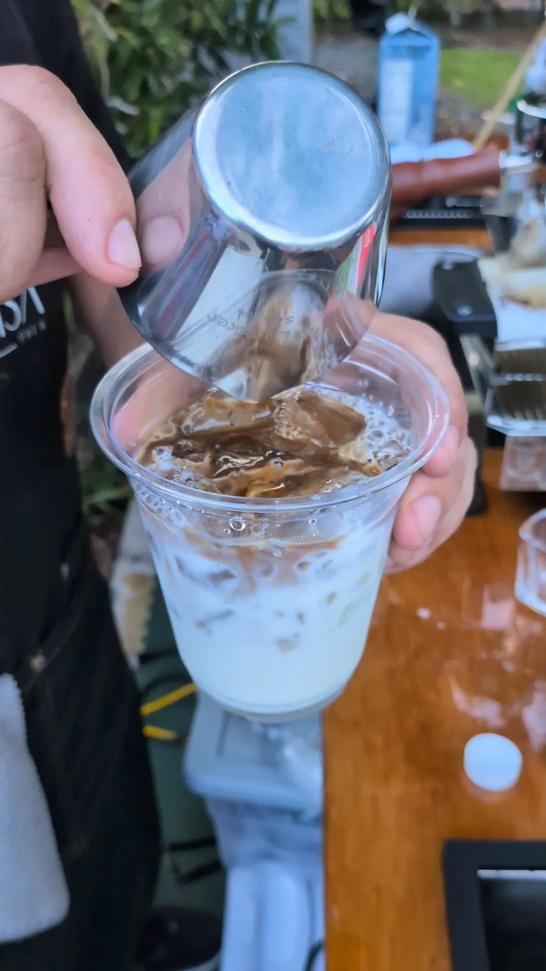 Cold brew coffee being poured over ice